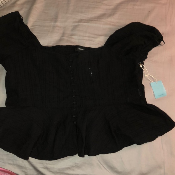 a black off the shoulder crop top - Picture 2 of 2